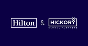Hilton and Hickory Global Partners company logos displayed on dark purple background.