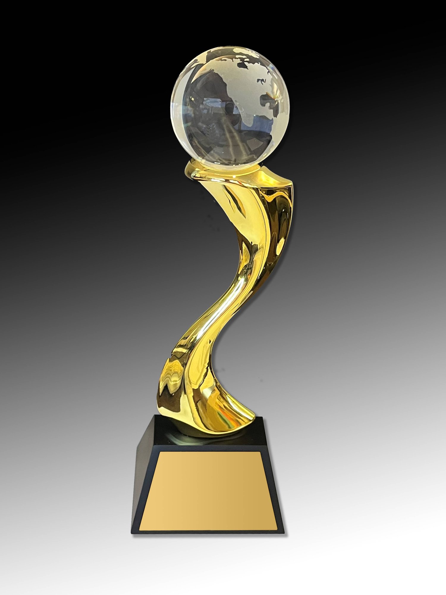 Magellan Award on black to white gradient background.