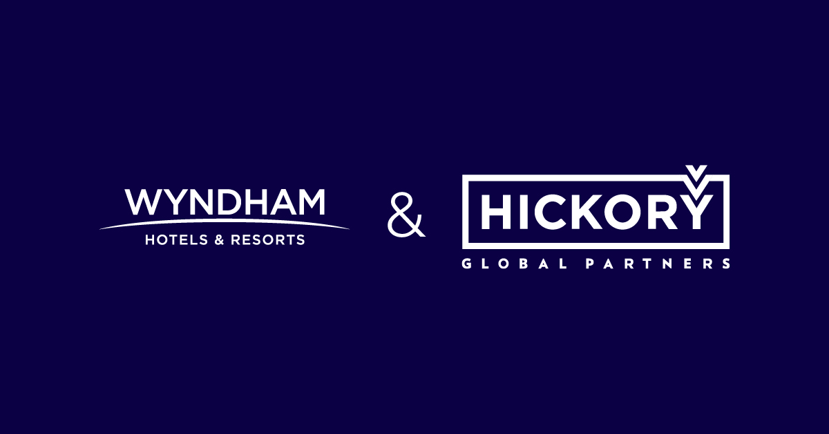 Wyndham Hotels & Resorts and Hickory Global Partners company logos displayed on dark purple background.
